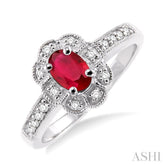 6x4 MM Oval Cut Ruby and 1/6 Ctw Round Cut Diamond Ring in 14K White Gold