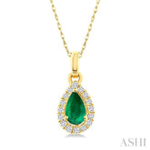 5x3 MM Pear Shape Emerald and 1/20 Ctw Round Cut Diamond Halo Precious Pendant with Chain in 10K Yellow Gold