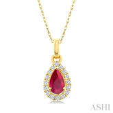 5x3 MM Pear Shape Ruby and 1/20 Ctw Round Cut Diamond Halo Precious Pendant with Chain in 10K Yellow Gold