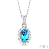 5x3 MM Oval Shape Blue Topaz and 1/20 Ctw Round Cut Diamond Halo Semi-Precious Pendant with Chain in 14K White Gold