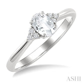 1/20 Ctw Oval Cut 6X4 MM White Topaz and Round Cut Diamond semi-precious Ring in 10K White Gold