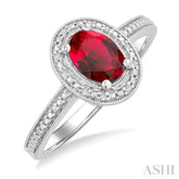7X5 MM Oval Shape Lab-Created Ruby and 1/50 Ctw Round Cut Diamond Precious Ring in Sterling Silver