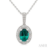 7X5 MM Oval Shape Lab-Created Emerald and 1/50 Ctw Round Cut Diamond Precious Pendant With Chain in Sterling Silver