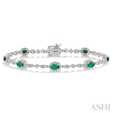 5x3 MM Oval Cut Emerald and 1/20 Ctw Round Cut Diamond Bracelet in 14K White Gold