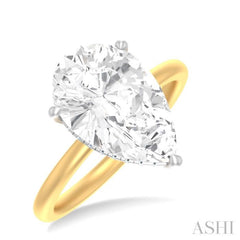 1/8 ctw Pear Shape Round Cut Diamond Semi Mount Engagement Ring in 14K Yellow and White Gold