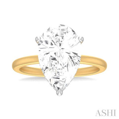 1/8 ctw Pear Shape Round Cut Diamond Semi Mount Engagement Ring in 14K Yellow and White Gold