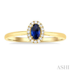 5x3 MM Oval Shape Sapphire and 1/20 Ctw Round Cut Diamond Halo Precious Ring in 10K Yellow Gold