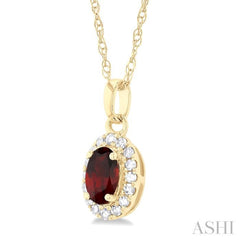 5x3 MM Oval Shape Garnet and 1/20 Ctw Round Cut Diamond Halo Semi-Precious Pendant with Chain in 14K Yellow Gold