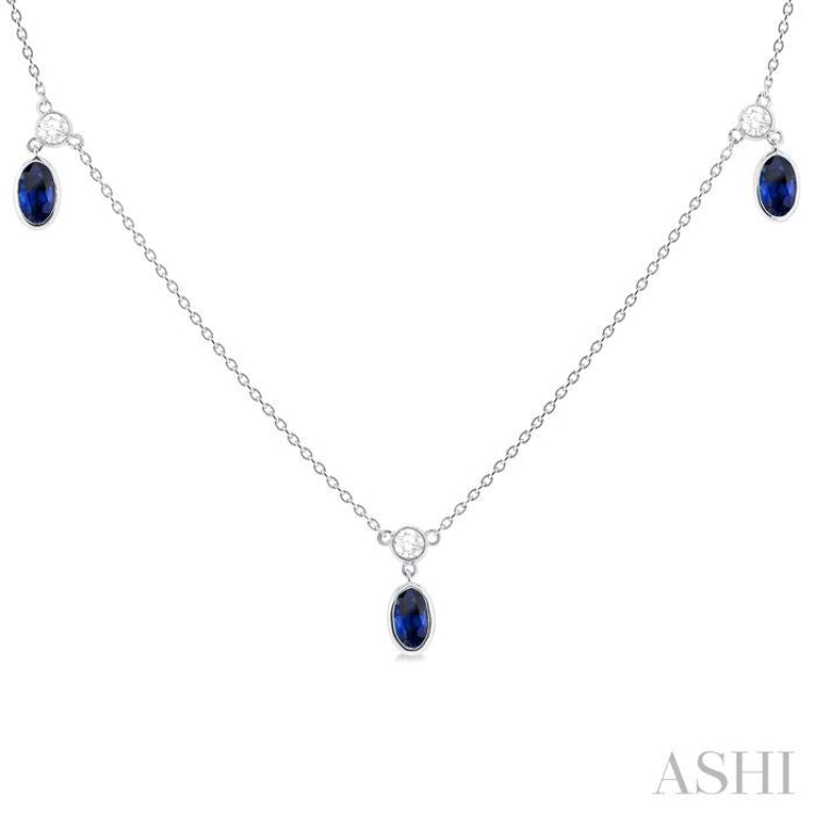 5x3 MM Oval Shape Sapphire and 1/8 Ctw Round Cut Diamonds Precious Station Necklace in 10K White Gold
