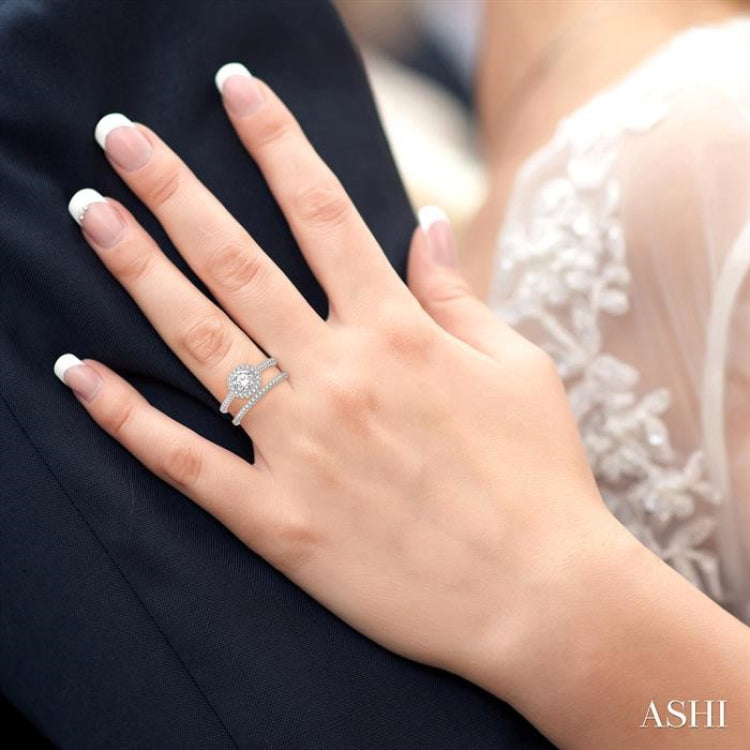7/8 Ctw Round Cut Diamond Wedding Set With 3/4 Ctw Round Cut Engagement Ring and 1/6 Ctw Wedding Band in 14K White Gold