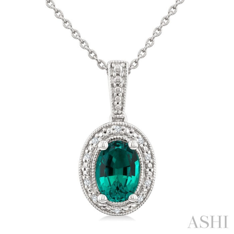 7X5 MM Oval Shape Lab-Created Emerald and 1/50 Ctw Round Cut Diamond Precious Pendant With Chain in Sterling Silver