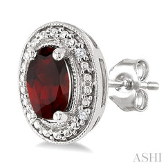 6X4 MM Oval Shape Garnet and 1/50 Ctw Round Cut Diamond Semi-Precious Earrings in Sterling Silver
