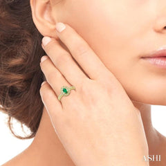 5x3 MM Oval Shape Emerald and 1/10 Ctw Round Cut Diamond Ring in 14K Yellow Gold.