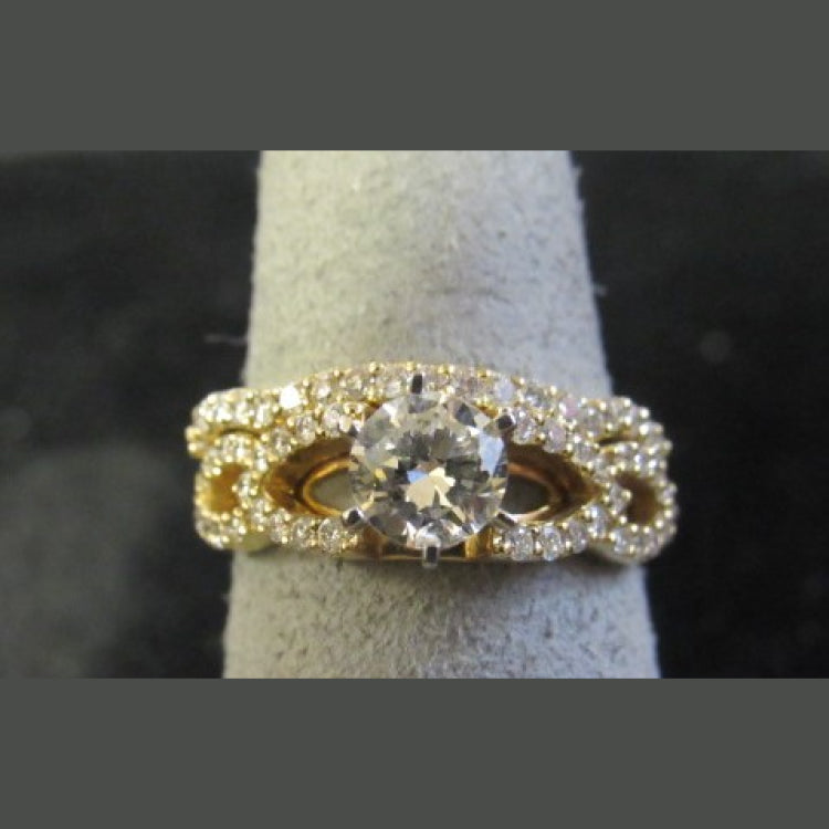 A 14k yellow gold bridal set 