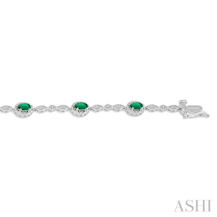 5x3 MM Oval Cut Emerald and 1/20 Ctw Single Cut Diamond Bracelet in 10K White Gold