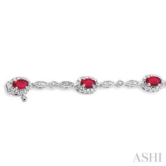 5x3 MM Oval Cut Ruby and 1/20 ctw Single Cut Diamond Bracelet in 10K White Gold