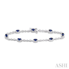 5x3 MM Oval Cut Sapphire and 1/20 ctw Single Cut Diamond Bracelet in 10K White Gold