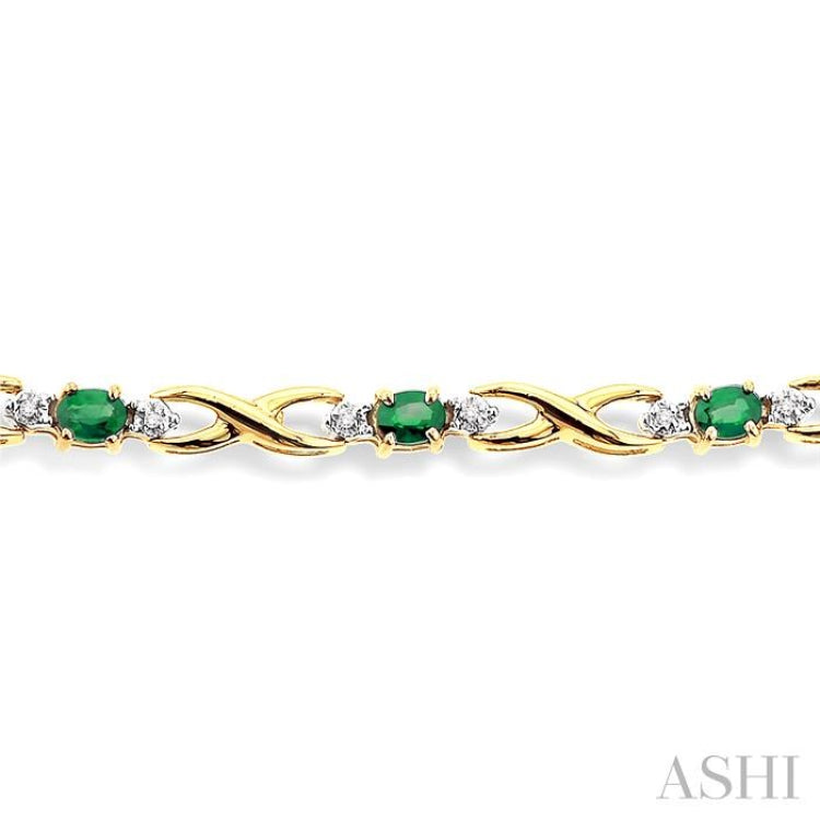 4x3 MM Oval Cut Emerald and 1/10 Ctw Single Cut Diamond Bracelet in 14K Yellow Gold