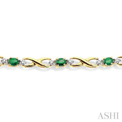 4x3 MM Oval Cut Emerald and 1/10 Ctw Single Cut Diamond Bracelet in 14K Yellow Gold