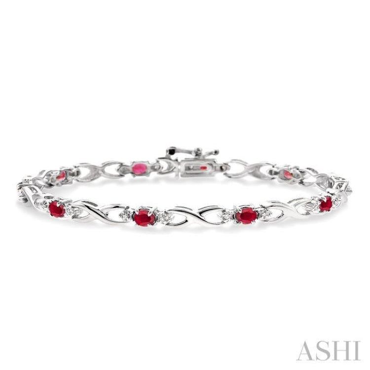 4x3 MM Oval Cut Ruby and 1/10 Ctw Round Cut Diamond Bracelet in 10K White Gold