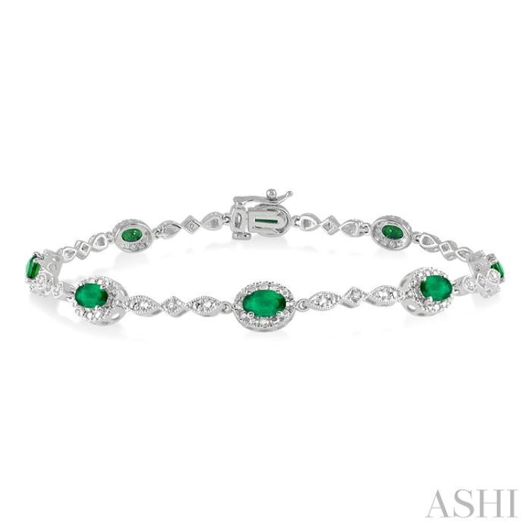 5x3 MM Oval Cut Emerald and 1/20 Ctw Single Cut Diamond Bracelet in 14K White Gold