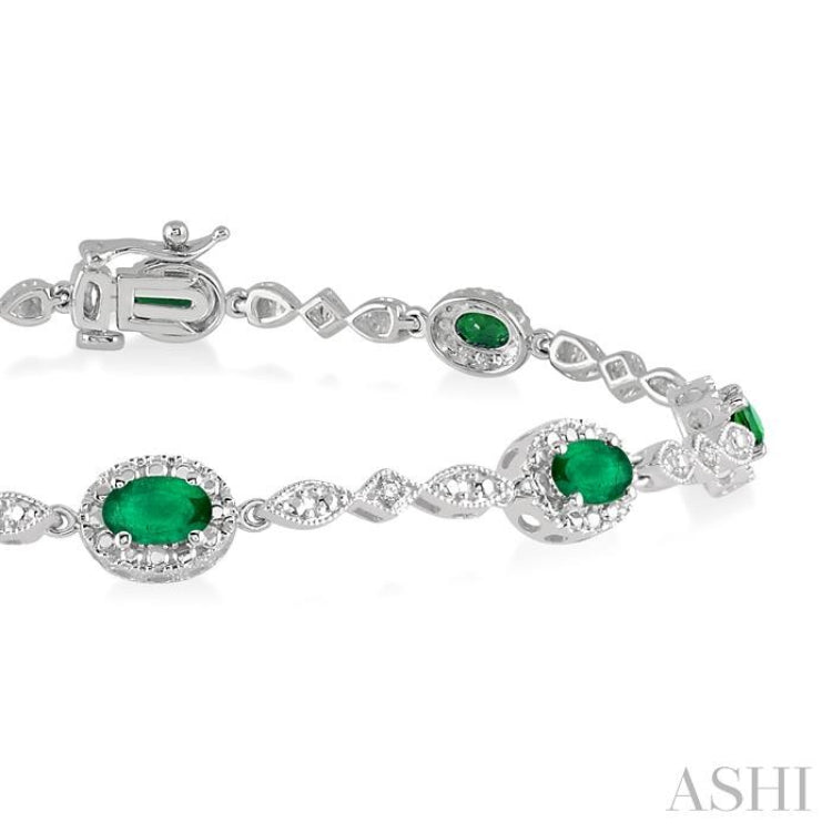 5x3 MM Oval Cut Emerald and 1/20 Ctw Single Cut Diamond Bracelet in 14K White Gold