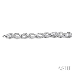 1/20 Ctw Swirl Shape Round Cut Diamond Bracelet in Sterling Silver