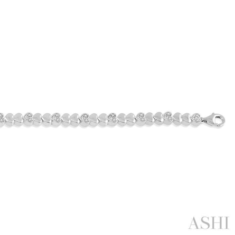 1/6 Ctw Puffed Heart Plain and Single Cut Diamond Fashion Bracelet in Sterling Silver