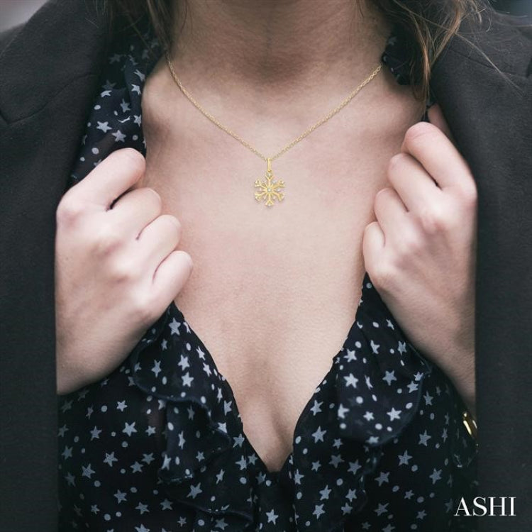 1/6 Ctw Petite Snowflake Round Cut Diamond Fashion Pendant With Chain in 10K Yellow Gold