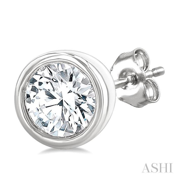 1/5 Ctw Petite Bezel Set Round Cut Diamond Fashion Stud Earrings in 10K White Gold