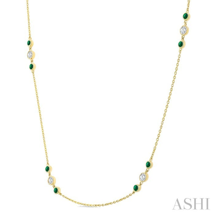 2.25 MM Emerald and 1/2 Ctw Round Cut Diamond Precious Station Necklace in 14K Yellow Gold