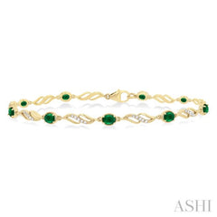 1/5 Ctw Oval Cut 4X3 MM Emerald and Round Cut Diamond Precious Eternity Link Tennis Bracelet in 10K Yellow Gold