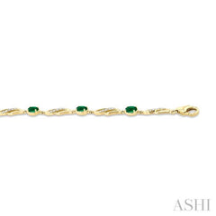 1/5 Ctw Oval Cut 4X3 MM Emerald and Round Cut Diamond Precious Eternity Link Tennis Bracelet in 10K Yellow Gold