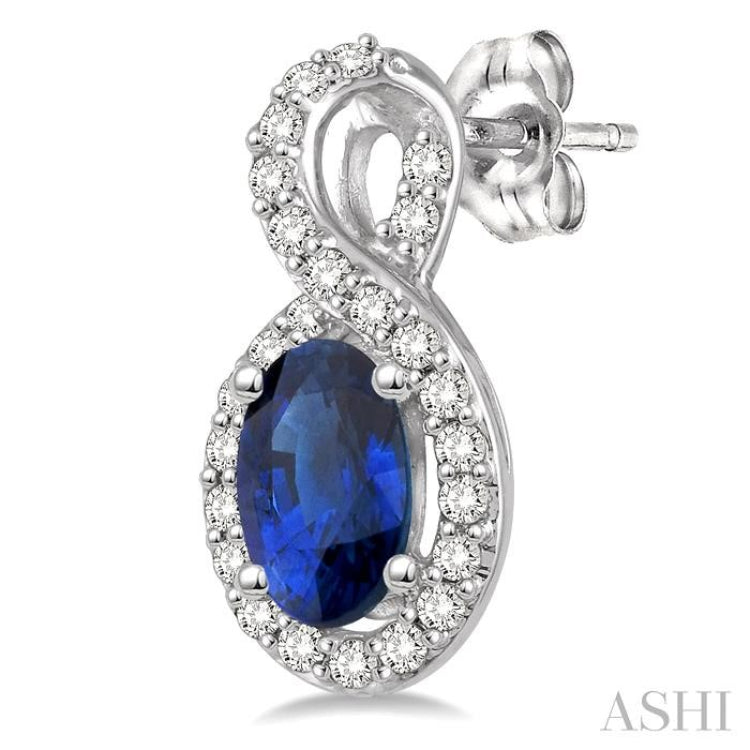 5x3 MM Oval Cut Sapphire and 1/5 Ctw Round Cut Diamond Earrings in 14K White Gold