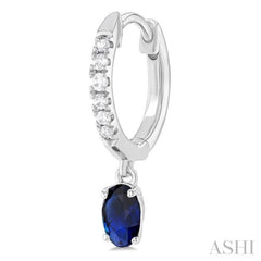 1/8 ctw Petite 5x3 MM Oval Cut Sapphire and Round Cut Diamond Precious Fashion Huggies in 10K White Gold