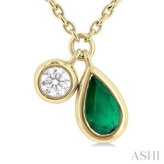 1/50 ctw Pear Cut 5X3MM Emerald and Bezel Set Round Cut Diamond Precious Necklace in 10K Yellow Gold