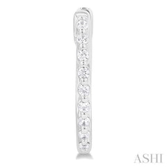 1/6 Ctw Petite Shared Prong Round Cut Diamond Hoop Earring in Sterling Silver