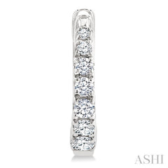 1/4 Ctw Graduated Round Cut Diamond Fashion Huggies in 14K White Gold