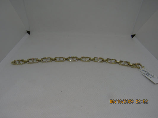 Yellow gold chain style bracelet with diamonds